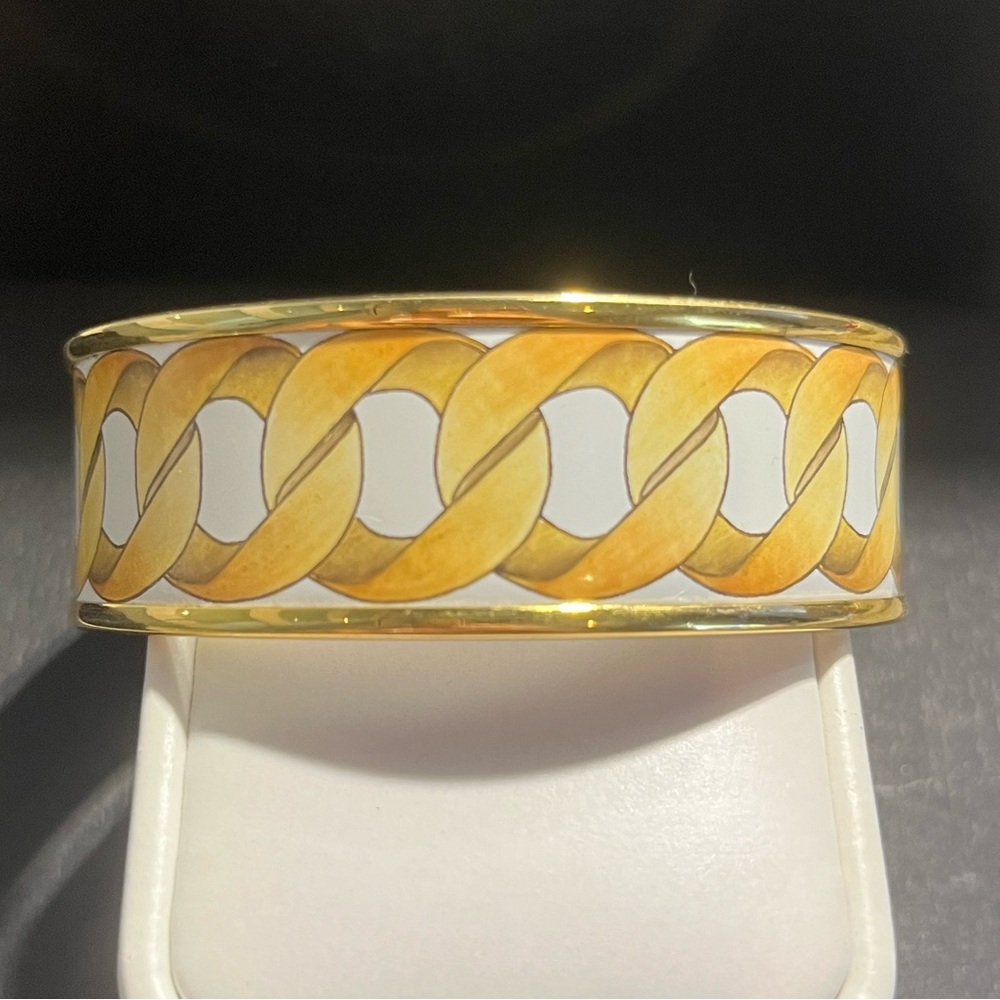 Trendy London Company Halycon Days gold enamel slip on bangle bracelet.